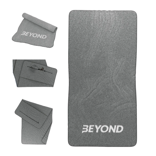 Beyond Grey microfibre gym towel shown folded and laid flat