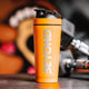 Orange Protein Shaker with Packaging, Orange Protein Shaker Packaging, Orange Protein Shaker, Orange protein shaker with packing, Orange protein shaker bottle brand packaging, Orange Insulated protein shaker, Orange Stainless Steel Protein Shakers, Protein Shaker