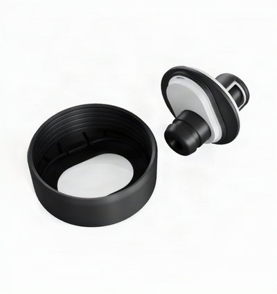 A black plastic replacement lid and inner seal component for a bottle or tumbler, shown disassembled on a clean white background.