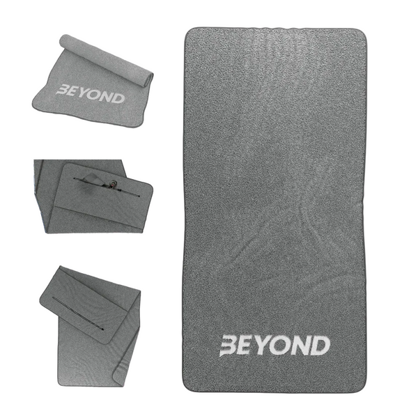 Beyond Grey microfibre gym towel shown folded and laid flat