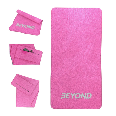 Beyond Pink microfibre gym towel shown folded and laid flat